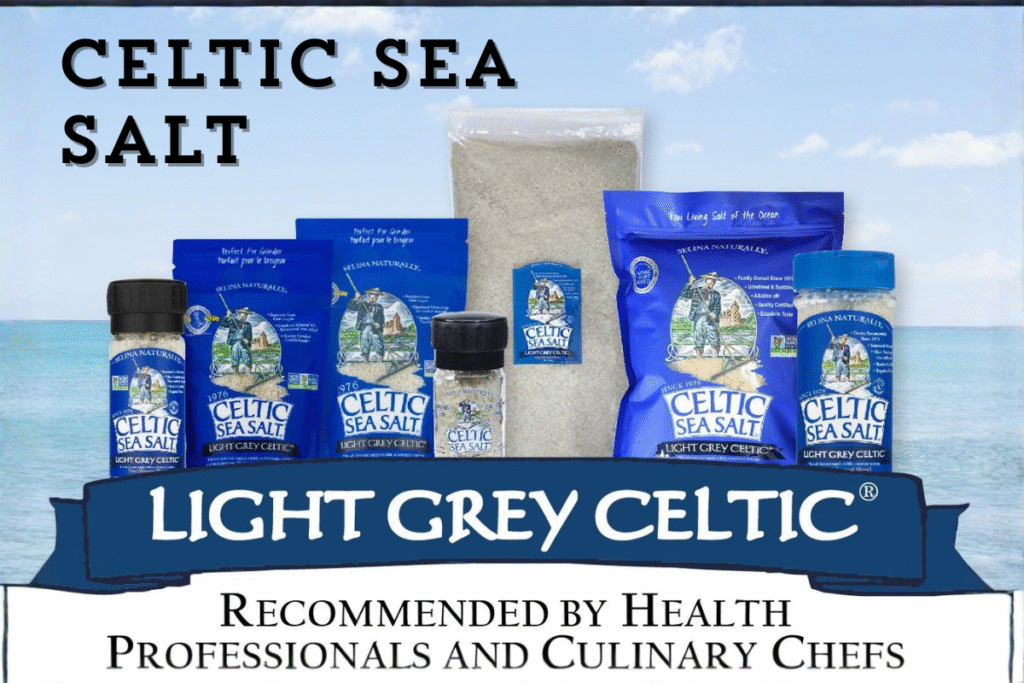 Celtic Sea Salt: 10 Best Health Benefits of Celticseasalt and the World’s Healthiest Salt A close-up shot of light-grey celtic sea salt fine ground in a wooden bowl, showcasing the moist, mineral-rich texture of authentic celticseasalt.