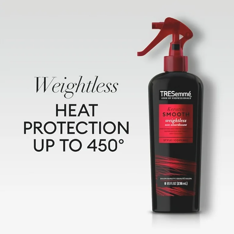 A bottle of TRESemmé Thermal Creations Heat Protection Spray being applied to hair to prevent heat damage.