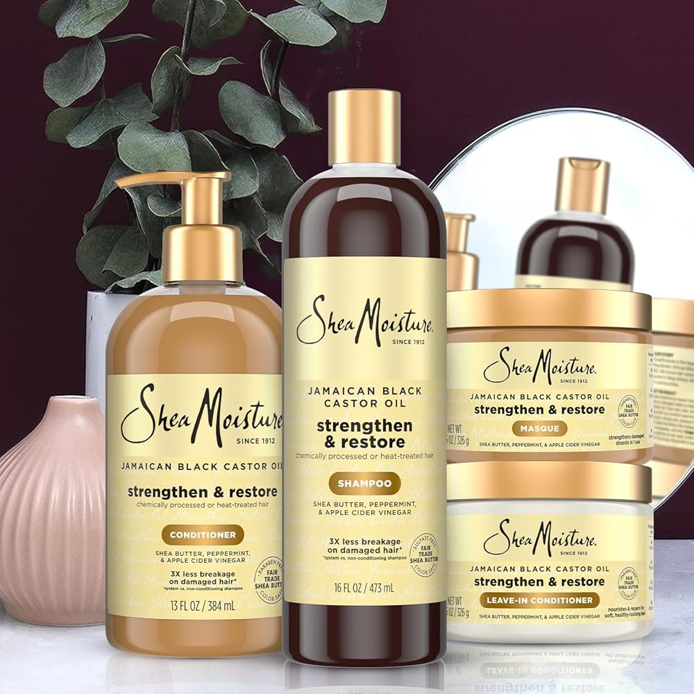 Jamaican Black Castor Oil hair masque being applied for hair growth and repair