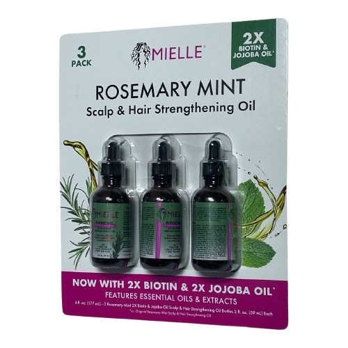 Close-up of a person using a glass dropper to apply Hair Strengthening Oil to their scalp partitions for follicle stimulation and deep nourishment.